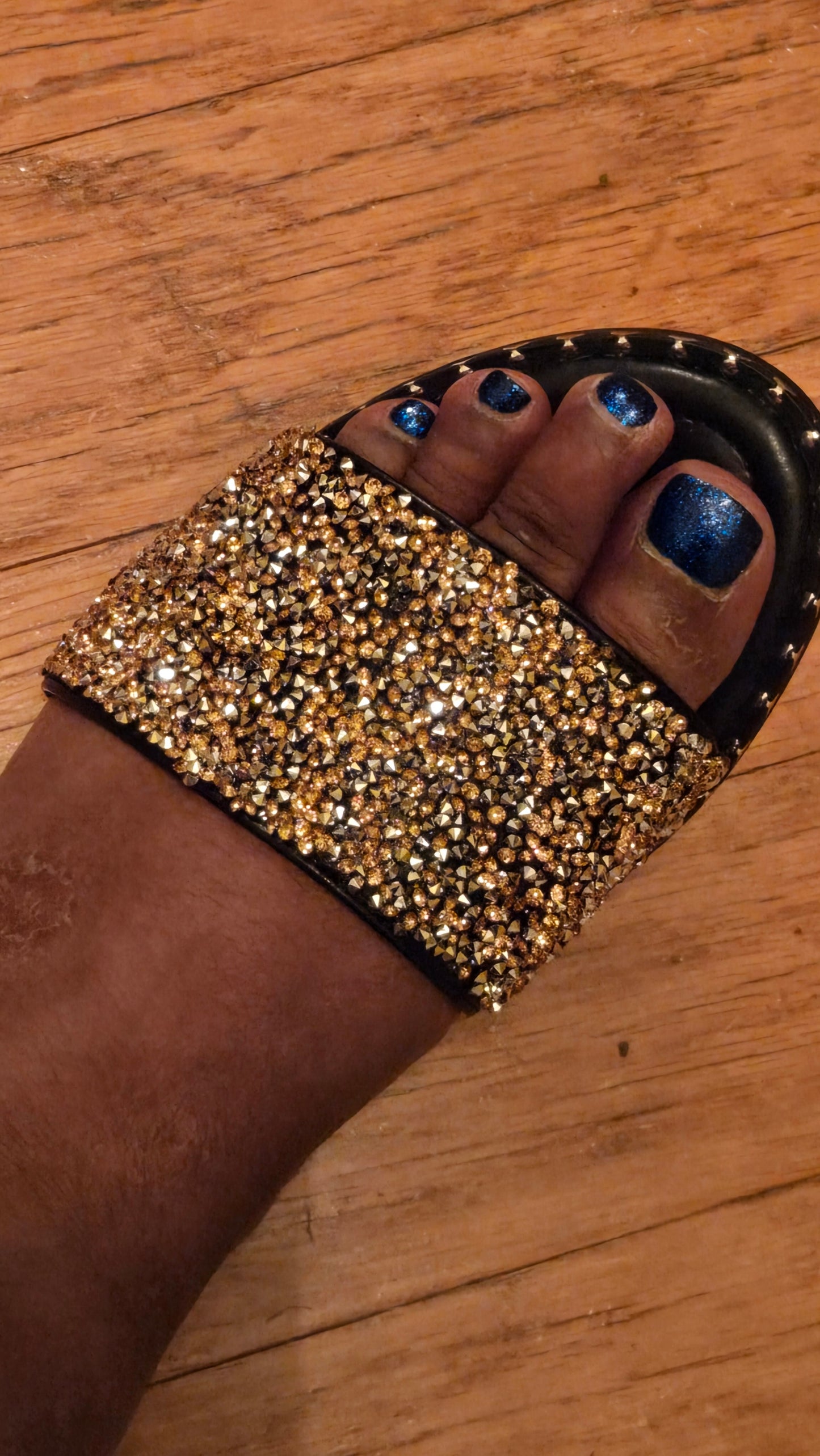 Black Pretty Diamond Slippers worn, showcasing sparkling gold rhinestones and open-toe style, perfect for fashionable streetwear looks.