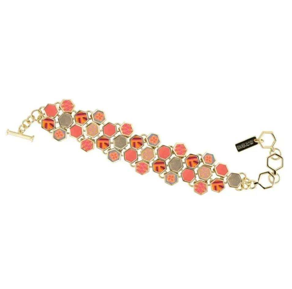 JILZARAH Hexagon Toggle Bracelet with coral-colored hexagon charms and black accents, stylish accessory for wrist.