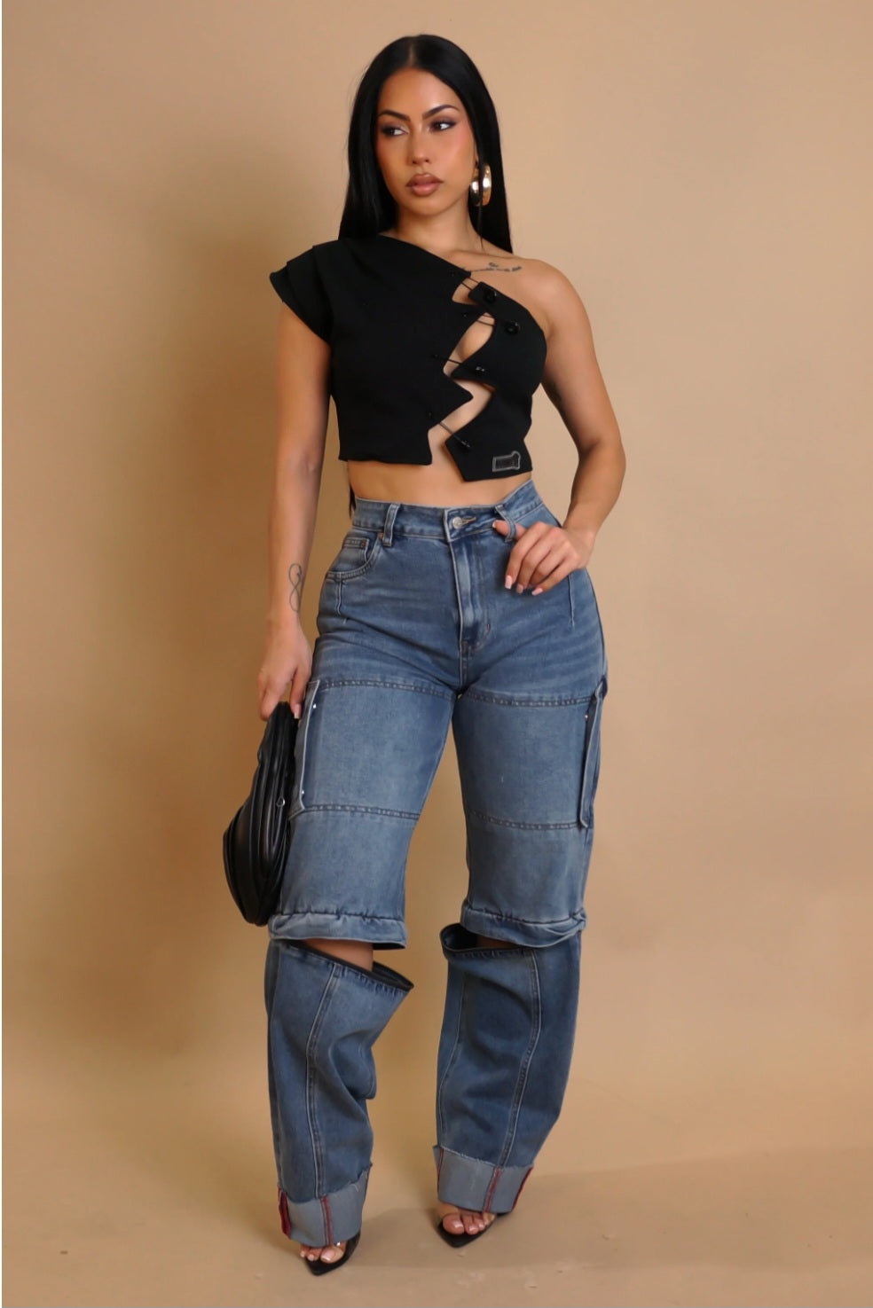 My Sexy Black letting me go jeans for women with denim fabric and knee zipper detail.