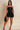 My Sexy Black Give It Up romper for women, stylish sleeveless jumpsuit with a fitted silhouette and trendy design.