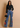 Women's patch denim jeans in blue from My Sexy Black, featuring stylish patchwork and classic denim design.