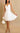 White Lena Mini Dress by My Sexy Black, stylish sleeveless mini dress with a fitted design, perfect for casual or dressy occasions.