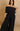 Addie off-shoulder 2-piece pants set by My Sexy Black featuring stylish top and matching pants, perfect for casual or trendy wear.