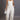 Cream-colored sissy overalls jumpsuit for women from My Sexy Black Boutique, featuring a stylish and comfortable design.