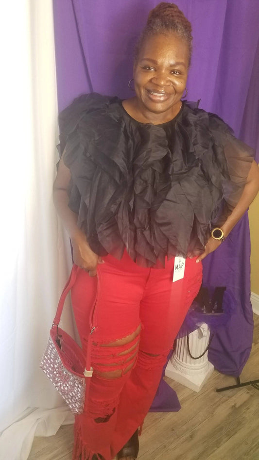 Plus size super red flare jeans from My Sexy Black Boutique, featuring vibrant red fabric and stylish wide-leg design.
