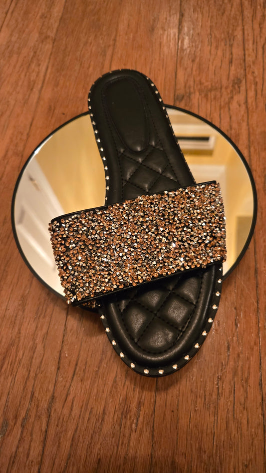 Pretty Diamond Slippers - Show My Toes in black with gold rhinestones, open-toe design on a mirror, ideal for casual or clubbing wear.