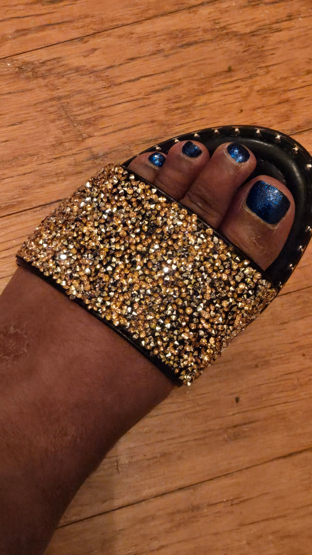 Black Pretty Diamond Slippers worn, showcasing sparkling gold rhinestones and open-toe style, perfect for fashionable streetwear looks.