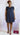 My Sexy Black Tee Mom Yoke Plus Mini Dress in Midnight with a fitted yoke design and short sleeves, stylish and comfortable for casual wear.