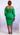 Plus size green two-piece skirt set by My Sexy Black Boutique featuring a stylish, fitted top and matching skirt.