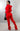 Red Zoey Jogger Set by My Sexy Black featuring comfortable joggers and a matching top, styled casually on a model.