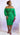 Plus size green two-piece skirt set by My Sexy Black Boutique, featuring stylish top and matching skirt for a trendy look.