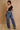 My Sexy Black Letting Me Go jeans, blue denim with distressed details, showcasing fit and stylish design.