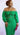 Plus size green two-piece skirt set from My Sexy Black Boutique featuring a stylish and comfortable coordinated outfit.