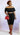 Plus size Taylor Ruched Black Skirt Set by My Sexy Black Boutique featuring a fitted two-piece design with ruched details.