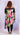 Pink and green plus size swirl two-piece legging set by My Sexy Black Boutique, featuring stylish, comfortable leggings and top.