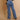 Women's patch denim jeans by My Sexy Black featuring blue denim fabric with stylish patch details and classic five-pocket design.