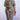 Plus size two-piece set from My Sexy Black Boutique featuring a colorful, stylish multi-patterned top and matching bottoms.