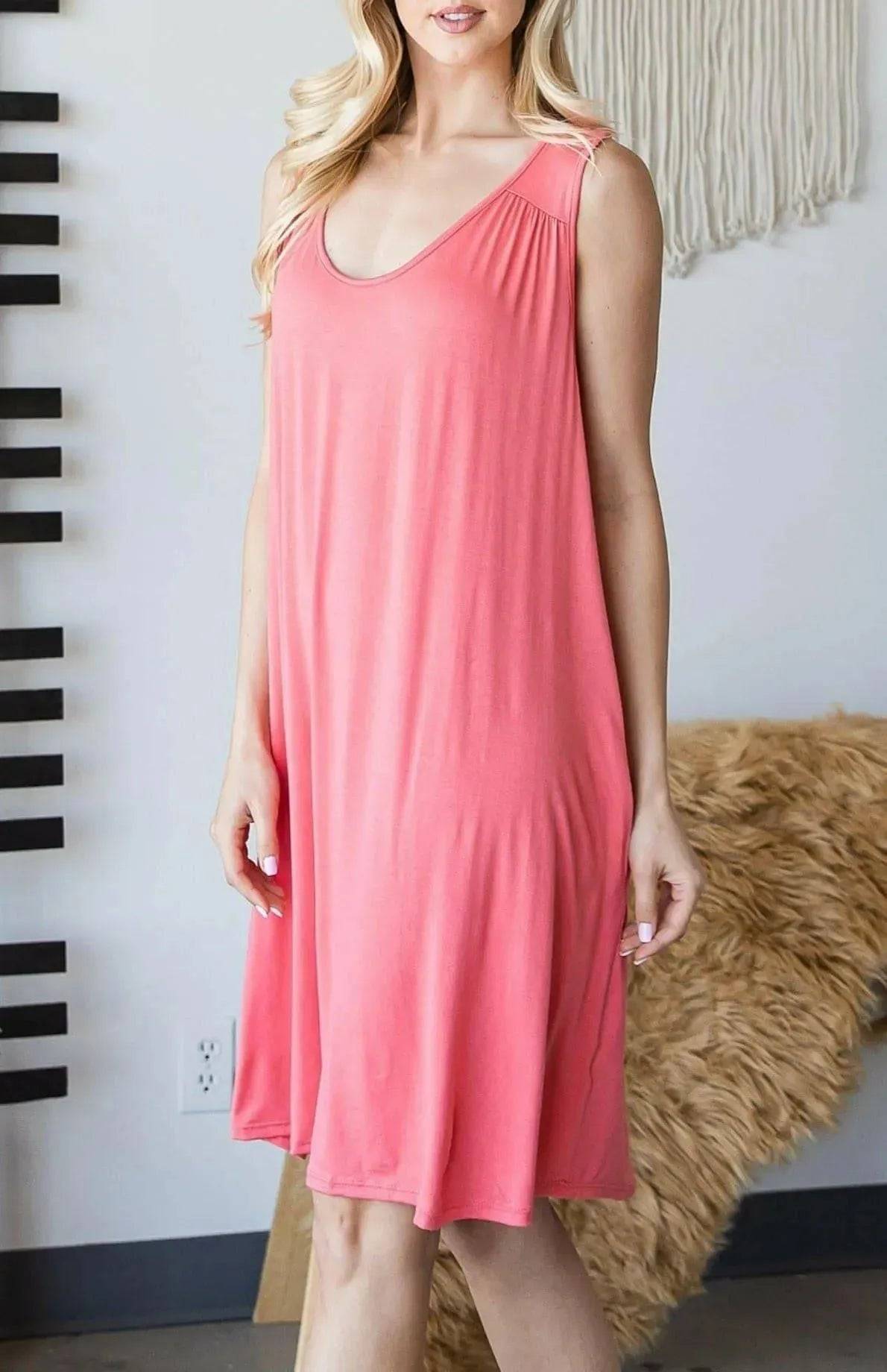 Front view of coral Sally Crochet Mini Dress with scoop neckline and relaxed fit, designed for comfort and stylish summer fashion.