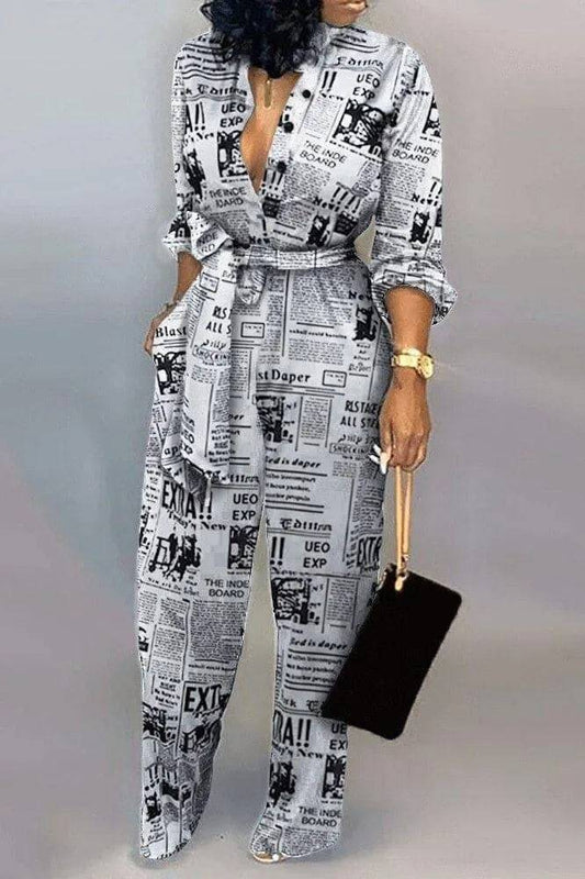 Black Advertiser jumpsuit with white accents, featuring a fitted design and stylish silhouette for modern fashion.