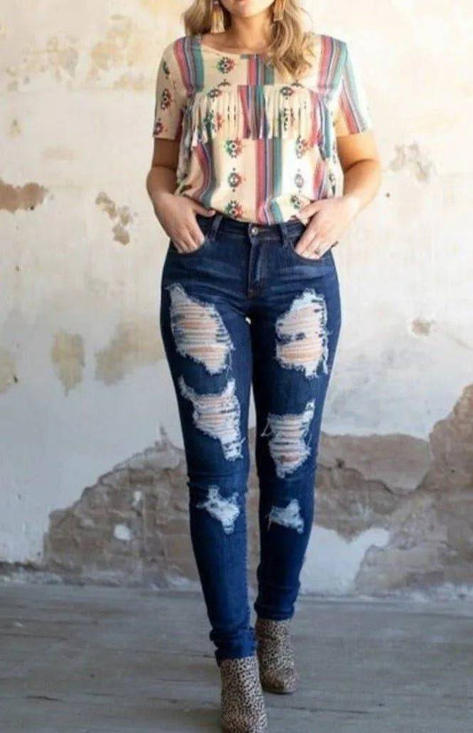 Dark wash Western ripped jeans from My Sexy Black Boutique, showing distressed details and classic jean style.