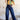 Dark wash high-waisted Flip waist jeans by My Sexy Black Boutique, showcasing a fitted denim style with classic stitching.