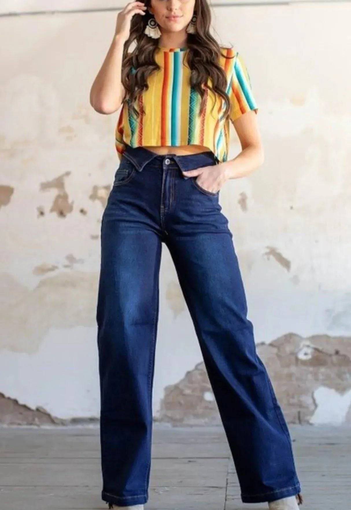 Dark wash high-waisted Flip Waist jeans by My Sexy Black Boutique, showing a fitted style with classic denim details.