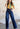 Dark wash high-waisted Flip waist jeans by My Sexy Black Boutique, showcasing a fitted denim style with classic stitching.