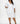 White Latoya V-neckline midi dress with long sleeves by My Sexy Black Boutique, featuring a stylish and elegant design.