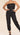 Black strapless jumpsuit from My Sexy Black's Wisper My Name collection, featuring a fitted design and stylish silhouette.