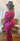 Baby girl wearing a fuchsia jumpsuit from My Sexy Black Boutique, adorable and comfortable for everyday wear.