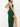 Hunter green draped wrap-style hi-low maxi evening dress by My Sexy Black Boutique, showcasing flowing fabric and elegant design.