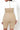 Beige high school romper jumpsuit by My Sexy Black Boutique featuring a stylish, casual design for trendy everyday wear.