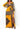 Yellow Jackie Maxi Dress from My Sexy Black Boutique, flowing fabric and sleeveless design, perfect for summer occasions.