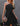 Black Jalynn short mini dress by My Sexy Black Boutique, fitted style with sleeveless design and scoop neckline.