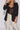 Black blazer with lapel detail and ruched sleeves paired with pintuck tapered trousers, stylish ensemble from My Sexy Black.