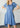 Denim Lou May V-neck mini dress by My Sexy Black Boutique, featuring a fitted V-neck and stylish mini length.
