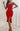Red Move-On midi dress by My Sexy Black Boutique, stylish mid-length dress with a flattering fit and vibrant color.