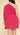 Fuchsia plus mini dress from My Sexy Black, featuring a stylish and fitted design, displayed on a hanger against a neutral background.