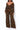 Black Penny jumpsuit by My Sexy Black Boutique, featuring a stylish, fitted design with adjustable straps and wide-leg pants.