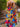 Rainbow halter maxi dress by My Sexy Black Boutique featuring vibrant rainbow colors and flowing fabric.