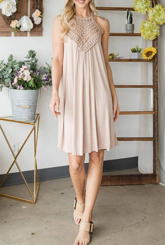 Sally Crochet Mini Dress in cream with lace accent halter neckline and spaghetti straps, knee-length flowy fit for casual summer wear.