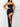 Black slit bust tube top maxi dress by My Sexy Black Boutique, featuring a fitted bodice and flowing skirt for evening wear.