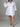Plus white shirt dress by My Sexy Black Boutique with button-down front and collar, styled as a trendy casual dress.
