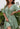 Sage green Whistle Free Mini Dress by My Sexy Black Boutique, sleeveless style, fitted silhouette, and above-knee length.