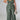 Women’s green plus size wide-leg pant set by My Sexy Black Boutique, featuring a two-piece design and relaxed fit.