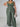 Women’s green plus size wide-leg pant set by My Sexy Black Boutique, featuring a two-piece design and relaxed fit.